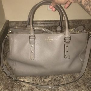 Gray Kate Spade purse.